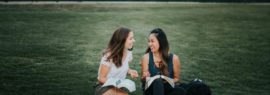 Friends reading the Bible together