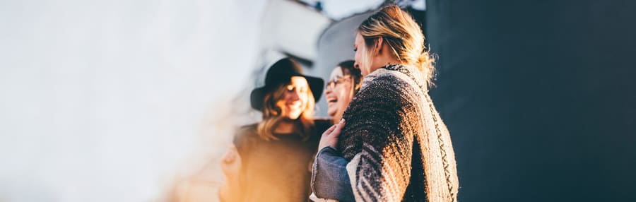 Friends talking over coffee